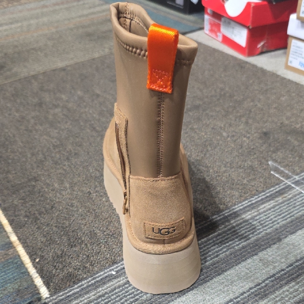 UGG Brown Boots with Bright Orange Accent